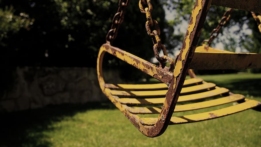 close-up photo, yellow, bucket swing, swing, old, oxide, rusty, old times, childhood, grow