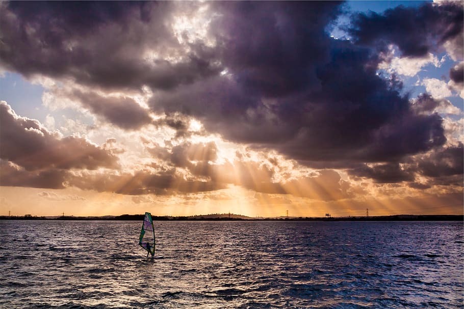 sunbeams, sky, clouds, sunset, windsurfing, water, ocean, sea, cloud - sky, one person