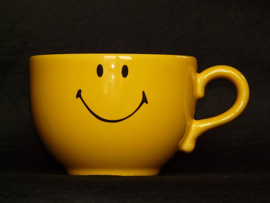 selective, focus photography, yellow, ceramic, cup, teacup, smiley, print, emoticon, drink