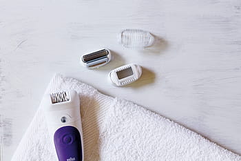 brown-epilator-shaving-female-woman-purple-royalty-free-thumbnail.jpg