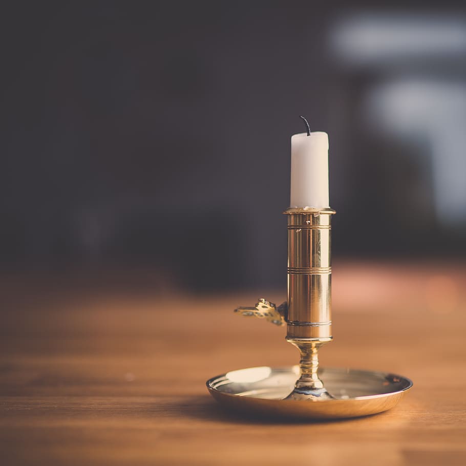 candle, wooden, table, rack, white, gold, bokeh, burning, indoors, focus on foreground