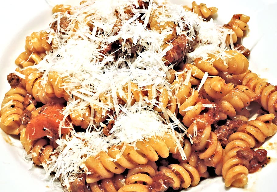 fusilli pasta, ragu meat sauce, cheese, food, meal, dinner, gourmet, lunch, food and drink, freshness