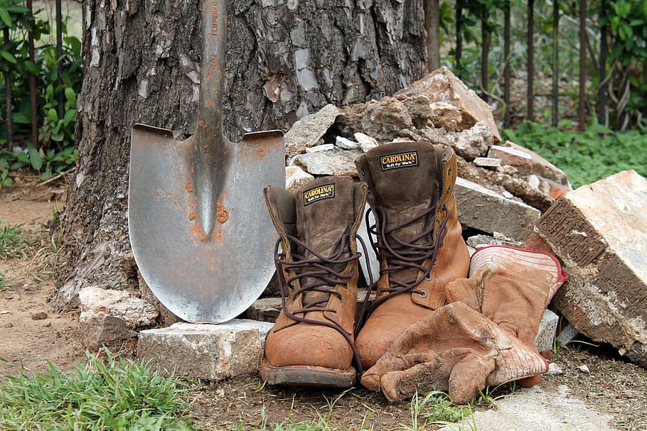 pair, brown, boots, black, shovel, piles, rocks, work, gloves, dirty