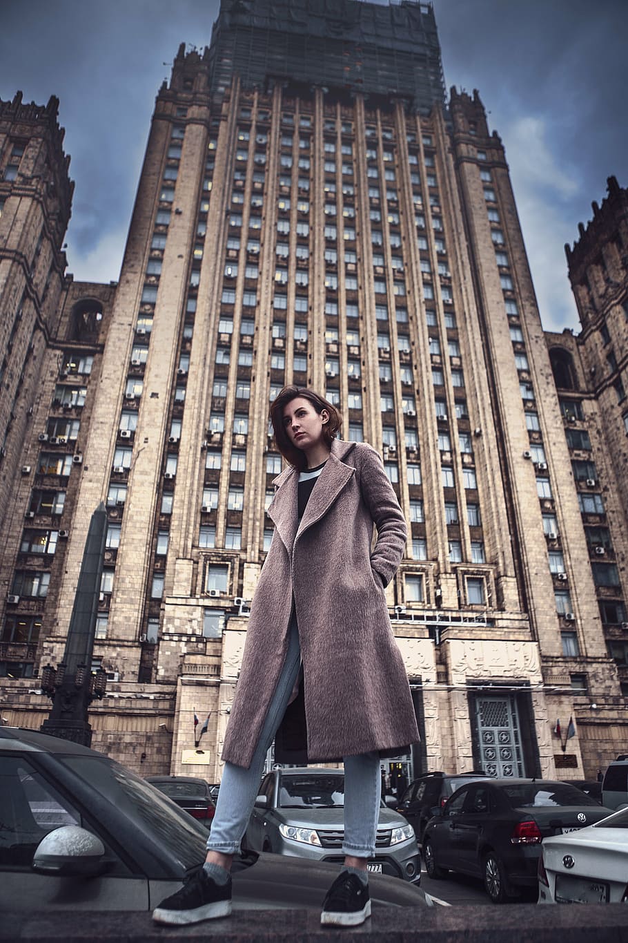low, angle photography, woman, brown, coat, front, building, view from the bottom, cloak, girl