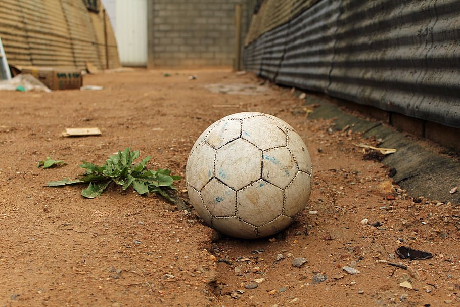 old, soccer, ball, abandoned, refugee, camp, soccer ball, team sport, focus on foreground, sports equipment