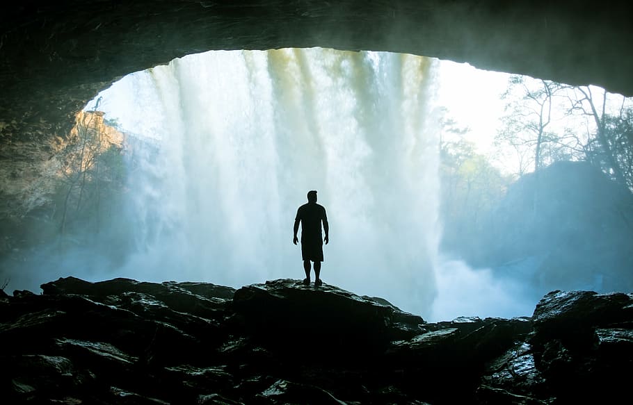 silhouette, man, standing, inside, cave, daytime, people, alone, rocks, waterfalls
