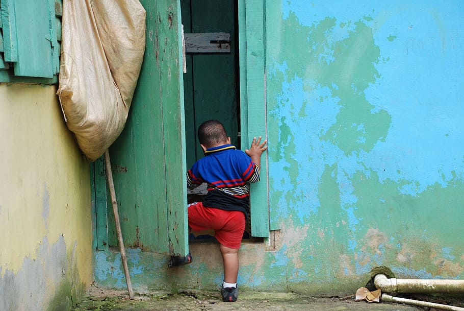 dominican republic, children, typical house, one person, full length, architecture, casual clothing, men, leisure activity, door