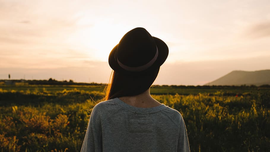 woman, grey, shirt, black, fedora hat, standing, daytime, country, fields, hats