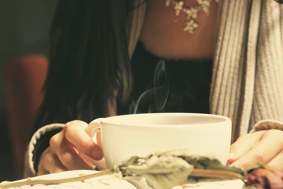 woman, holding, white, ceramic, coffee mug, steam, poem, sad, sadness, letter