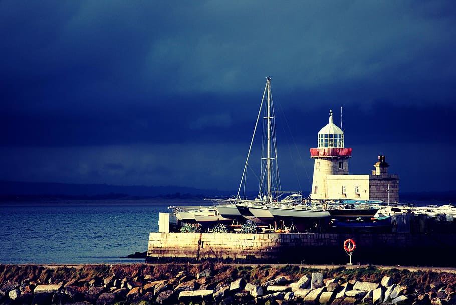 lighthouse, surrounded, boats, near, body, water, coast, rocks, ocean, sea