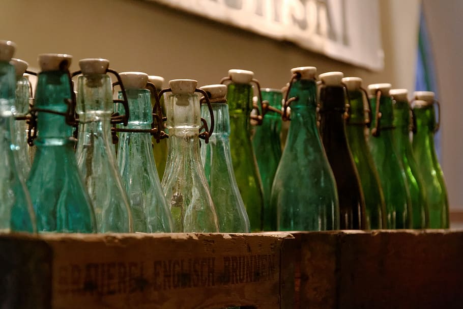 green, bottles, empty, case, drinks, bottle, container, in a row, indoors, large group of objects
