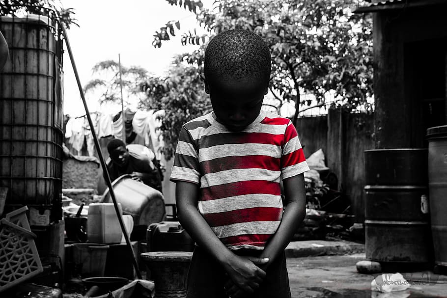 selective, color photography, boy, wearing, stripe shirt, looking, kid, child, sad, red