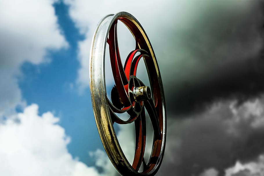 gray, red, motorcycle wheel, clouds, sky, nature, tire, metal, cloud - sky, outdoors