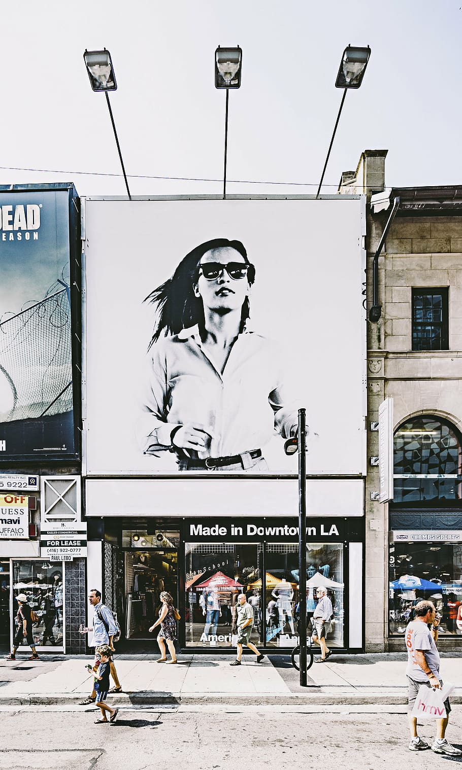 person, showing, billboard, woman, architecture, building, design, store, shopping, mall