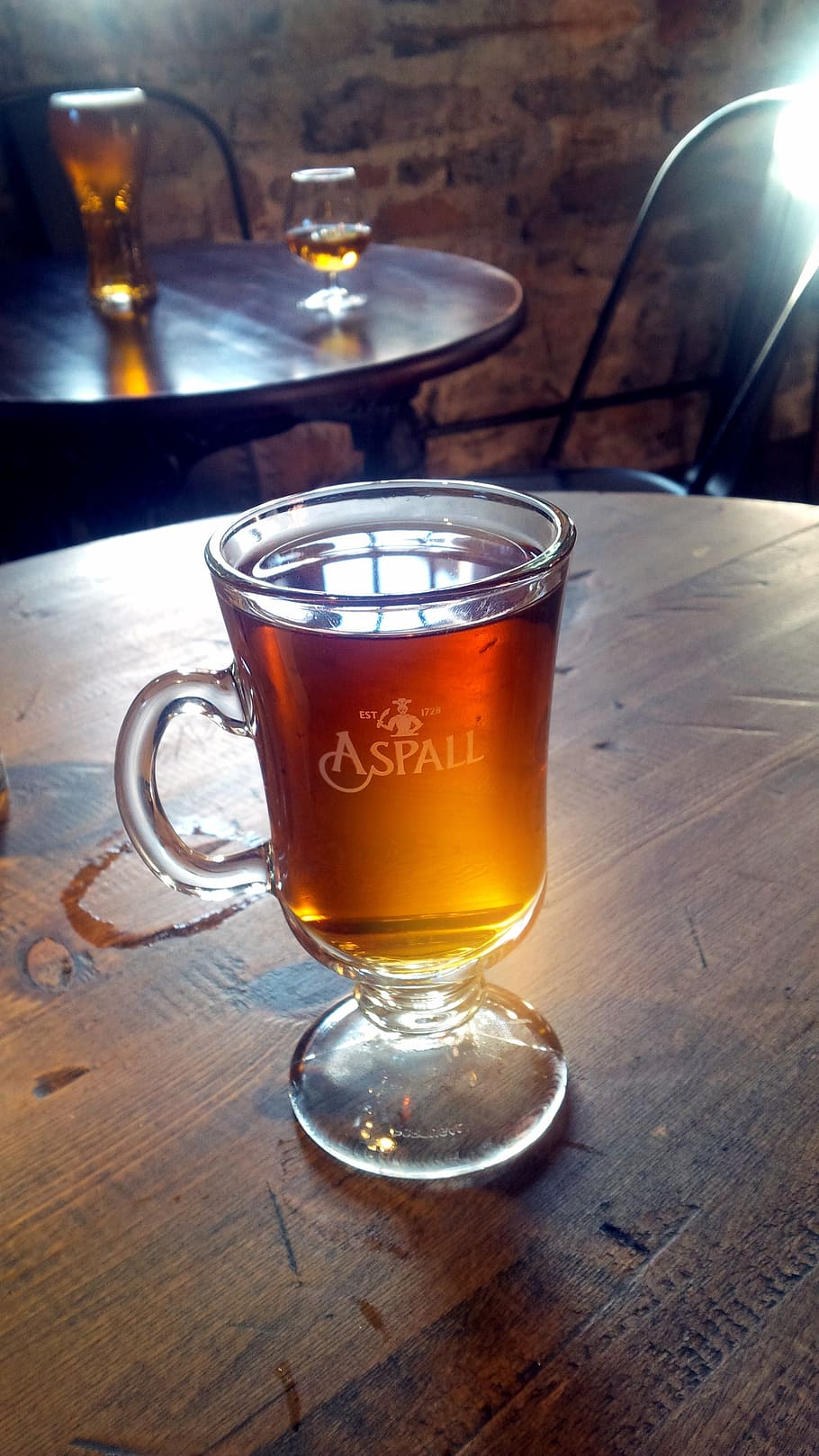 clear, glass cup, filled, brown, liquid, wooden, table, drink, mulled cider, alcohol