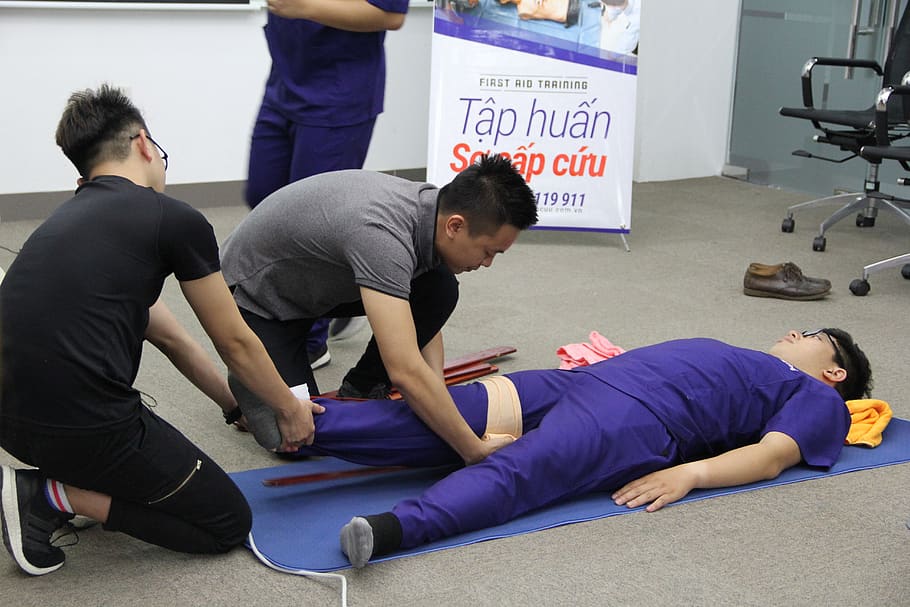 wellbeing, first aid, viet nam, real people, group of people, full length, exercising, lifestyles, men, sport