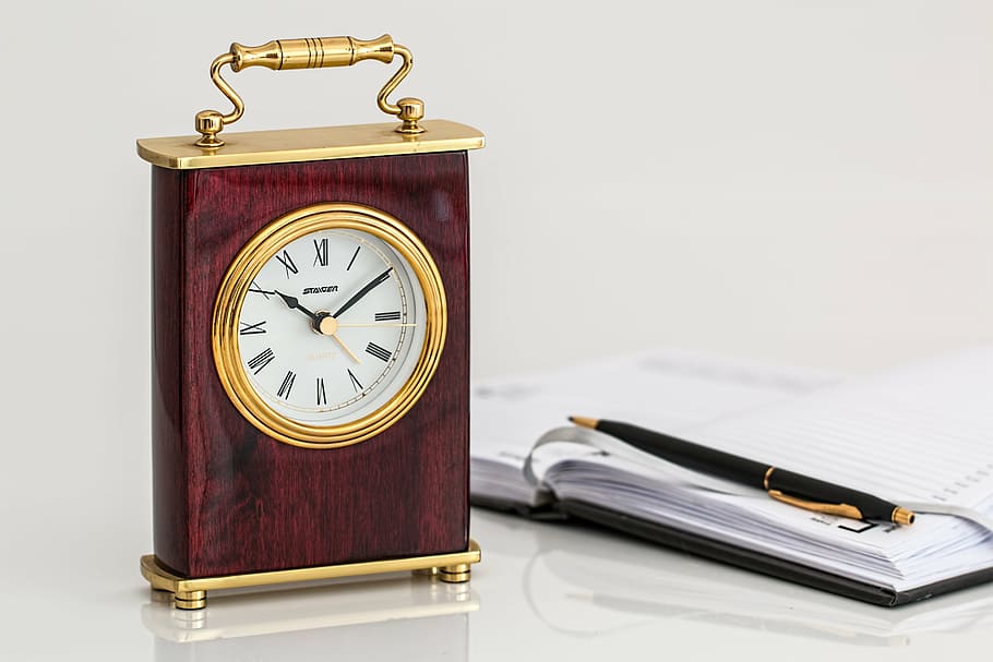 brown, gold table clock, showing, 10:10, carriage clock, timepiece, time, minutes, hours, ageing
