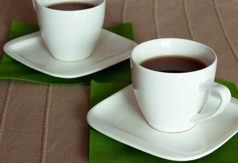 two, cups, coffee, placed, brown, sheet, tea, teacup, green, white