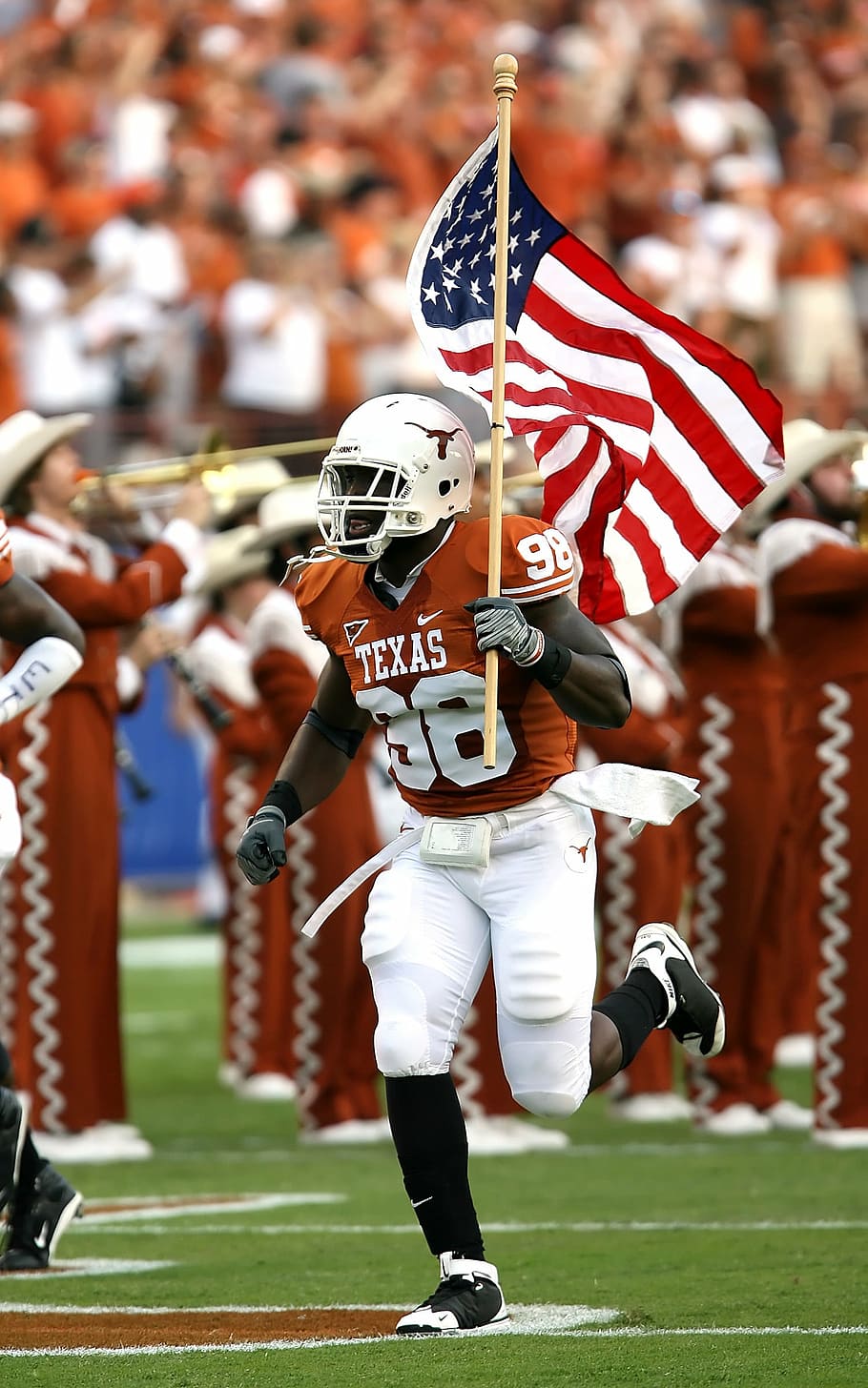 jugador de fútbol, ​​celebración, bandera de EE. UU., corriendo, fútbol americano, bandera, bandera americana, barras y estrellas, fútbol de texas, fútbol universitario