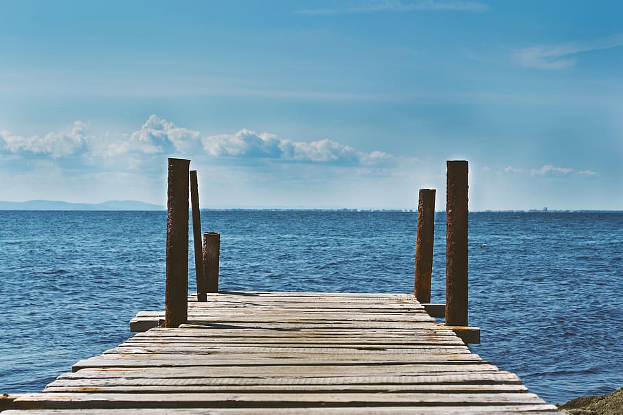 brown, wooden, dock, ocean, daytime, surrounded, body, water, lake, blue