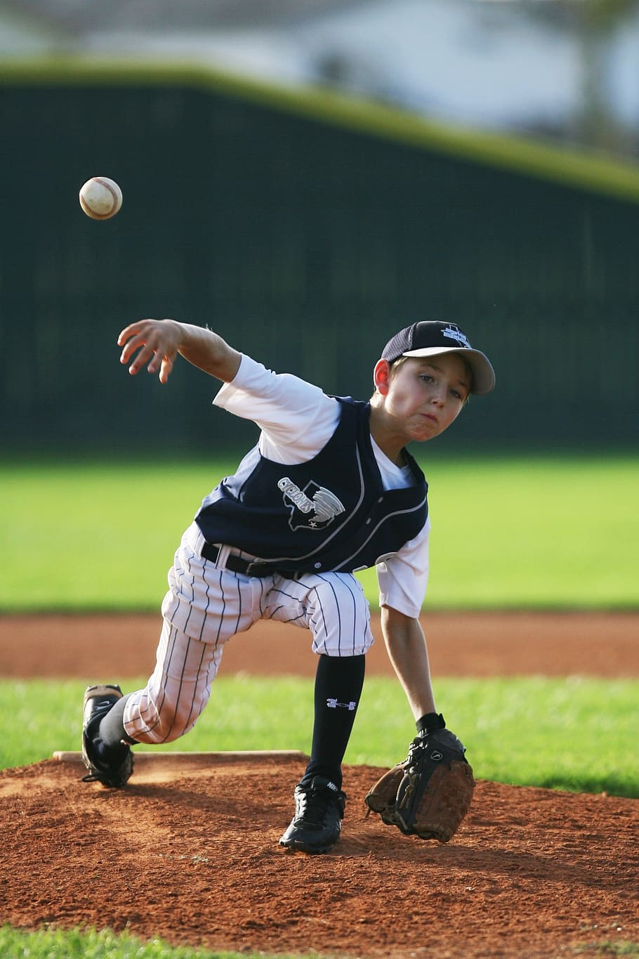 boy playing baseball, baseball, pitcher, youth league, mound, pitch, pitching, action, throwing, ball