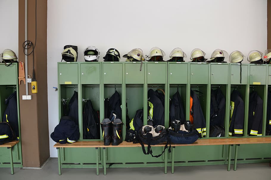 fire, locker, dresses, helmets, shoes, protective clothing, indoors, in a row, large group of objects, green color