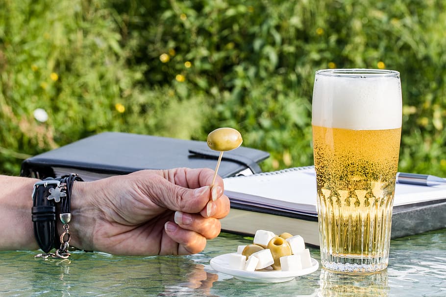 person, holding, nut, Work, Beer Glass, Green Olives, after work, feta cheese, closed books, hand