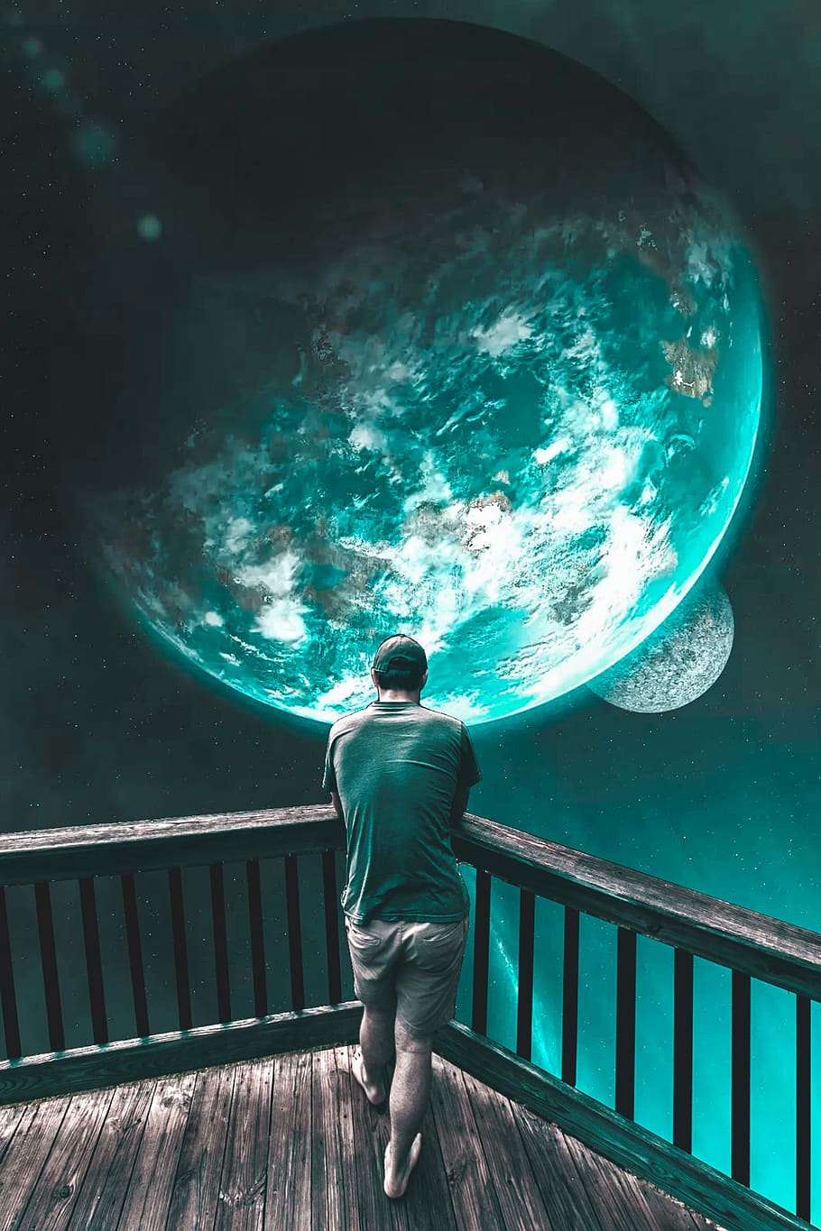 planet, man, balcony, fantasy, photoshop, one person, real people, railing, standing, rear view