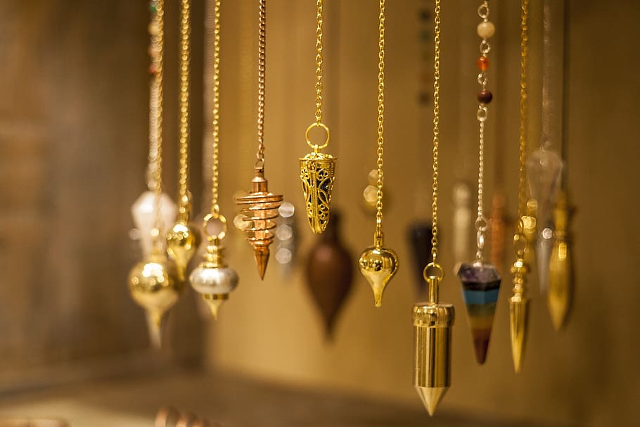 gold-colored necklaces, pendant, pendule, stones, pendulous, gold colored, hanging, gold, metal, selective focus
