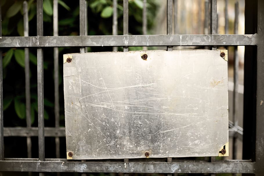 shield, metal, metal sign, fence, gateway, copy space, metal fence, note, close-up, focus on foreground