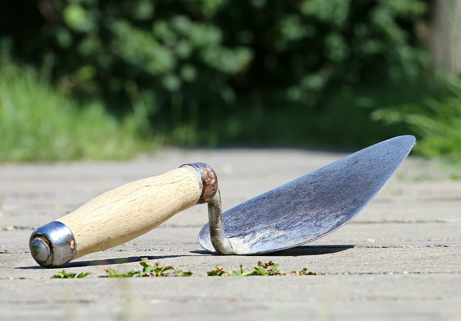 close-up photo, brown, wooden, hand tool, floor, trowel, spatula, construction, mason, tool