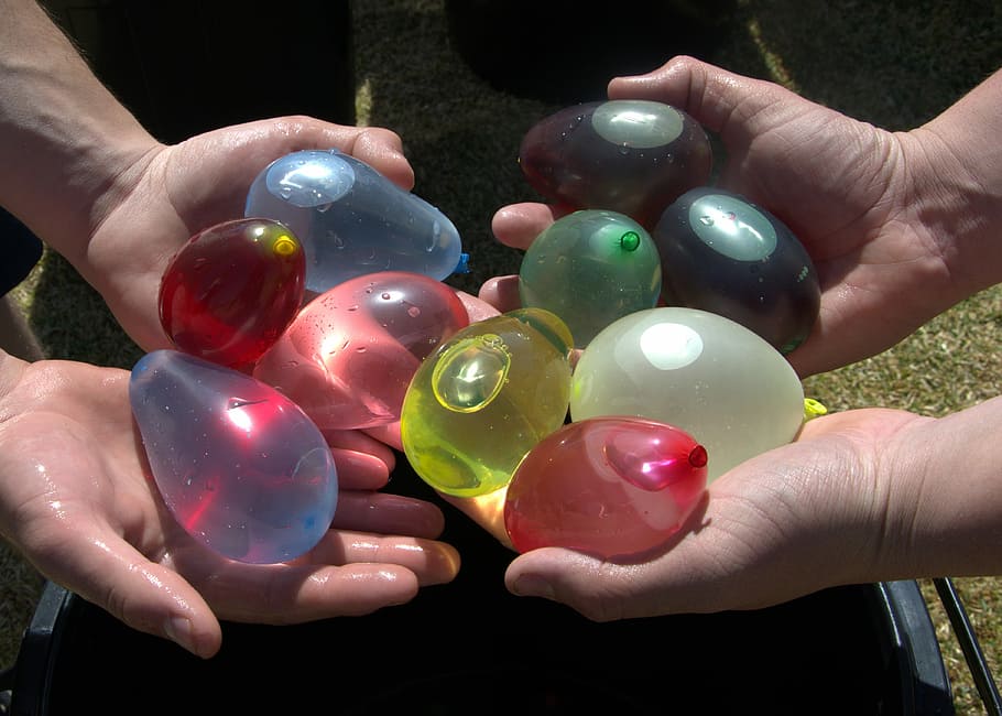 Water Balloons, Colourful, comparing, human hand, human body part, marbles, holding, people, one person, hand