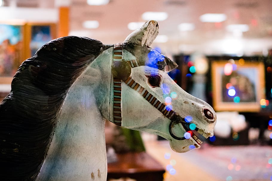 lights, bokeh, party, celebration, horse, toy, animal, focus on foreground, close-up, representation