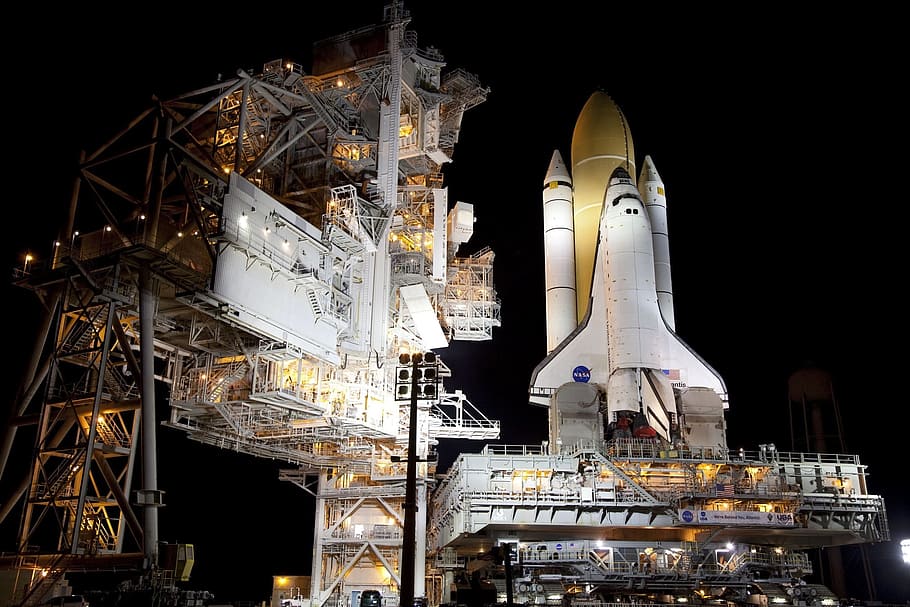 white, yellow, space shuttle, nighttime, atlantis space shuttle, rollout, launch pad, pre-launch, astronaut, mission