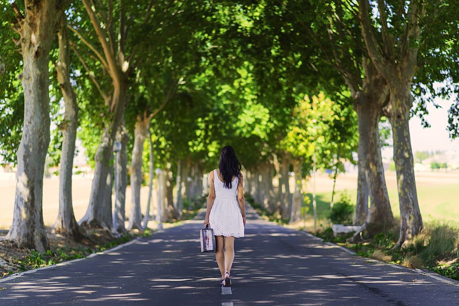 woman, white, dress, walking, road, daytime, suitcase, person, happy, calm