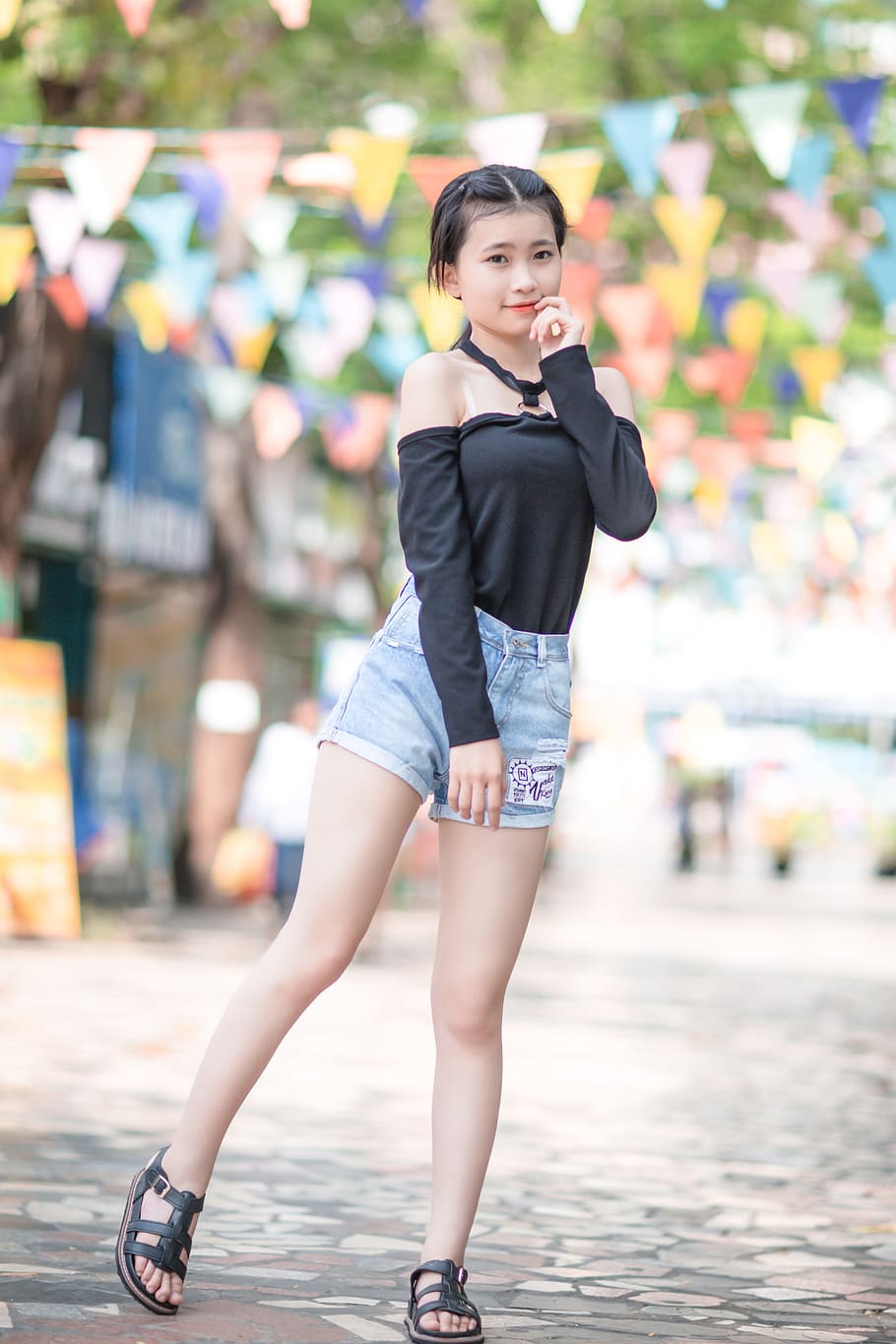 girl, black, cold-shoulder blouse, blue, stone-washed denim cuffed, short, shorts outfit, pictorial, daytime, girl in black