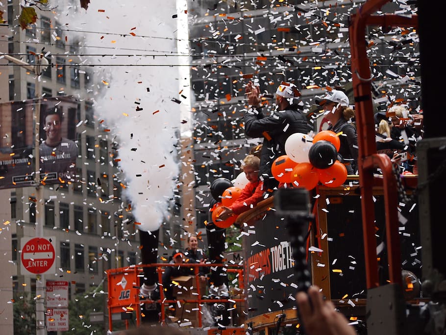 confetti, parade, san francisco, sf giants, crowd, fans, cheering, architecture, city, transportation
