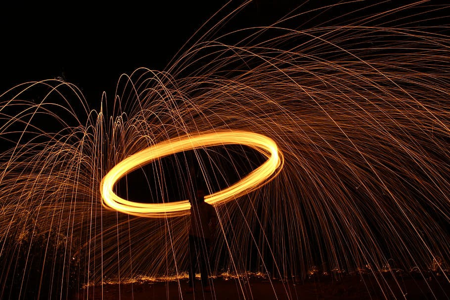 silhouette macro photography, fire lasso, steel wool, lights, fireworks, circle, night, amazing, spark, shower