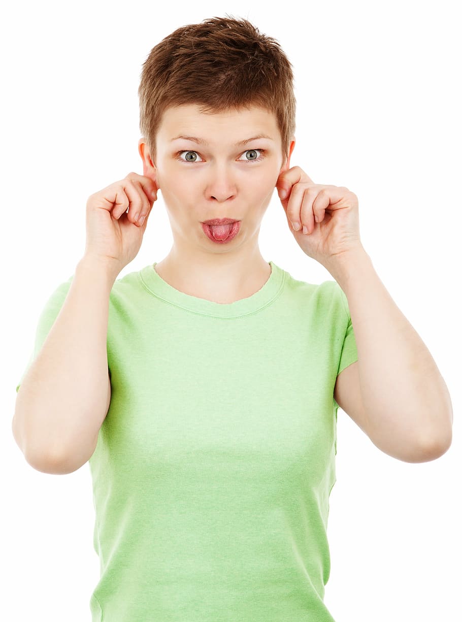 woman, holding, hear, ears, sticking, tongue, adult, crazy, expression, face