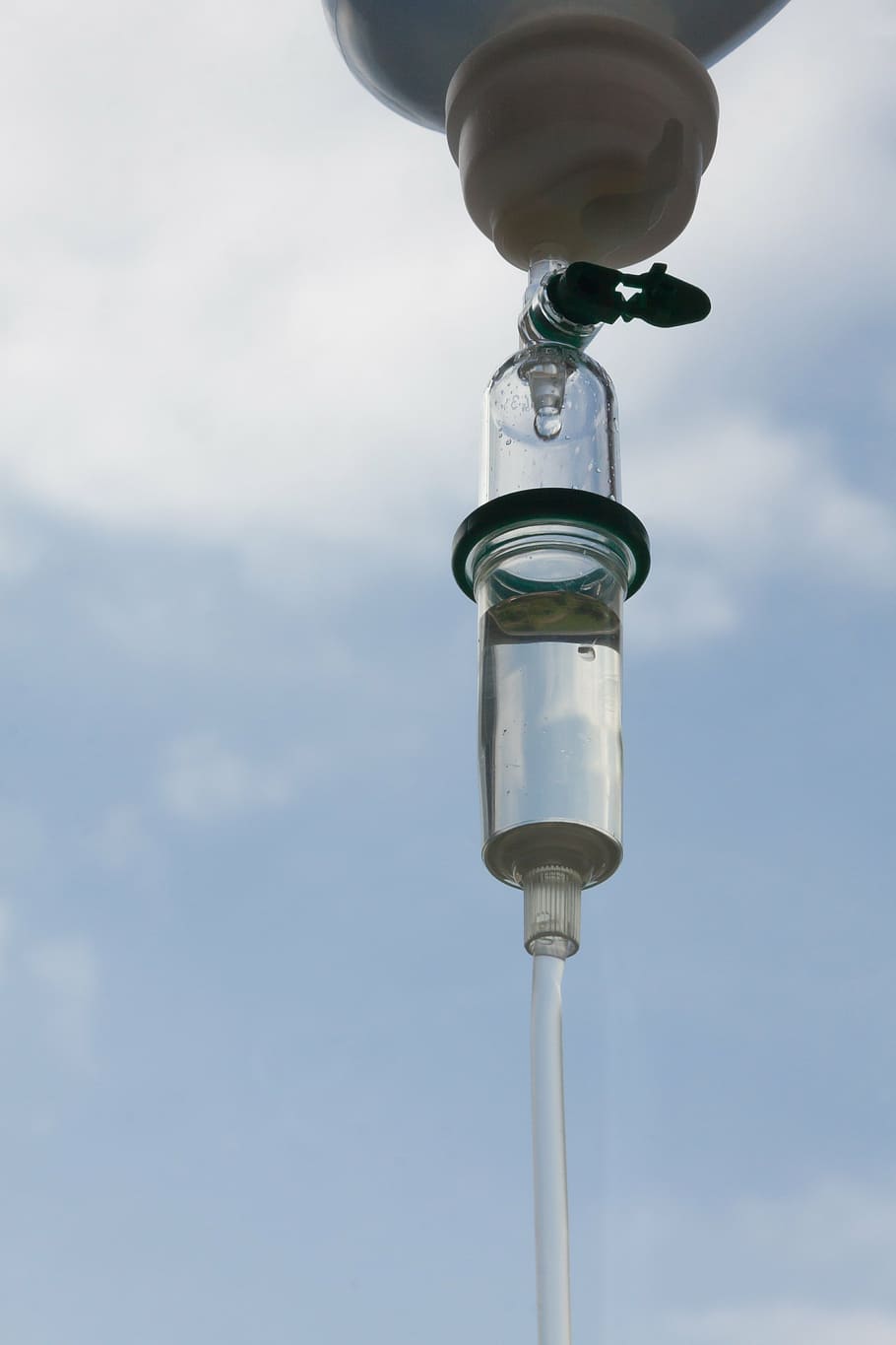 clear glass container, hospital, infusion, drip, antibiotic, liquid, low angle view, sky, cloud - sky, day