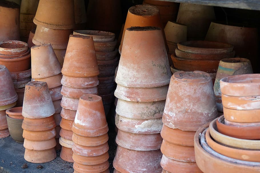 flower pots, pots, pottery, large group of objects, stack, abundance, market, indoors, still life, high angle view
