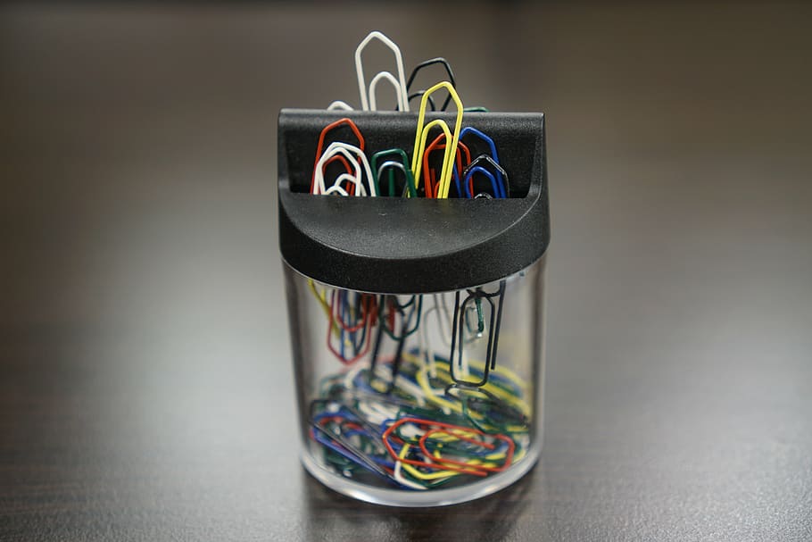 paper clips, clear, glass container, binder, office, magnet, work desk, stationery, paper, colorful