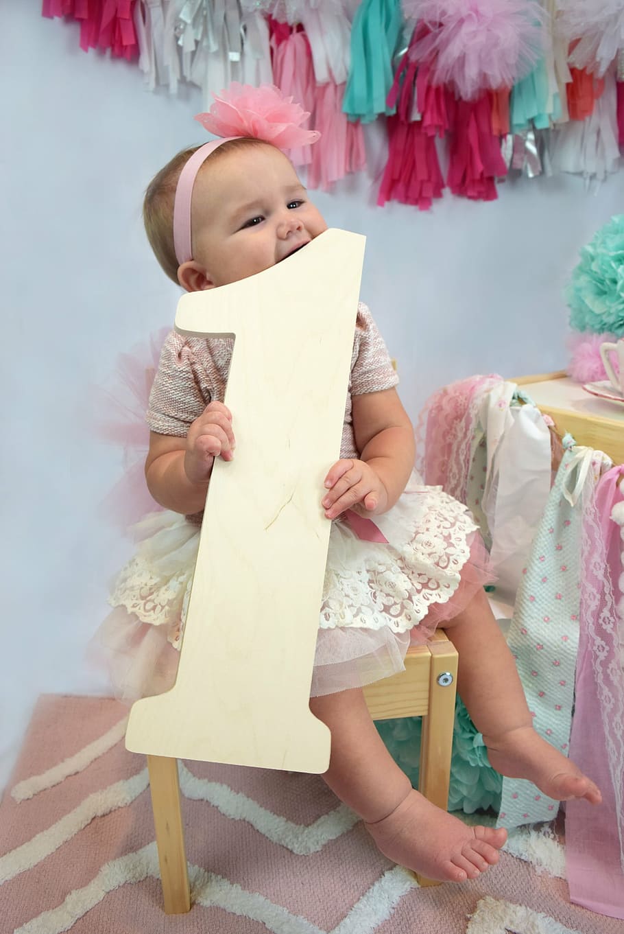 girl, holding, letter 1 standee, sitting, stool, one year old, infant, baby, one, happy