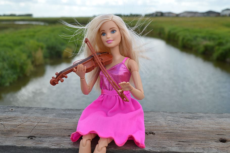 barbie, playing, violin gesture, brown, wooden, dock, violin, doll, pink, dress