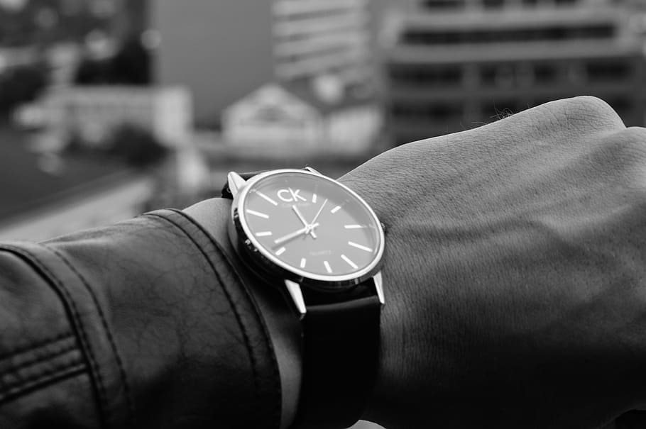 grayscale photography, calvin klein analog, watch, calvin klein, hand, wristwatch, time, clock, focus on foreground, close-up
