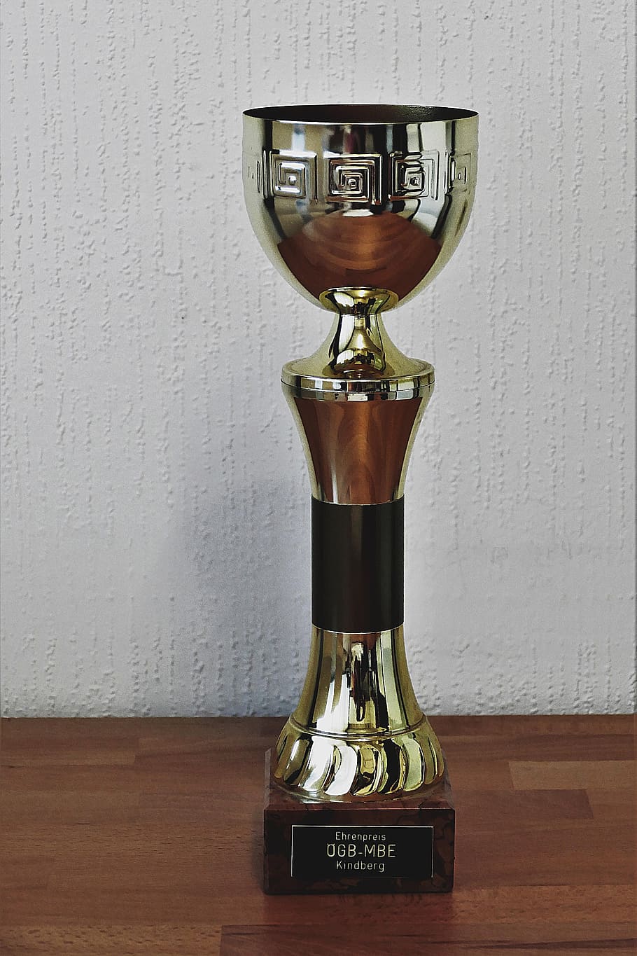 gold-colored, brown, trophy cup, wooden, surface, cup, trophy, award, sport, profit