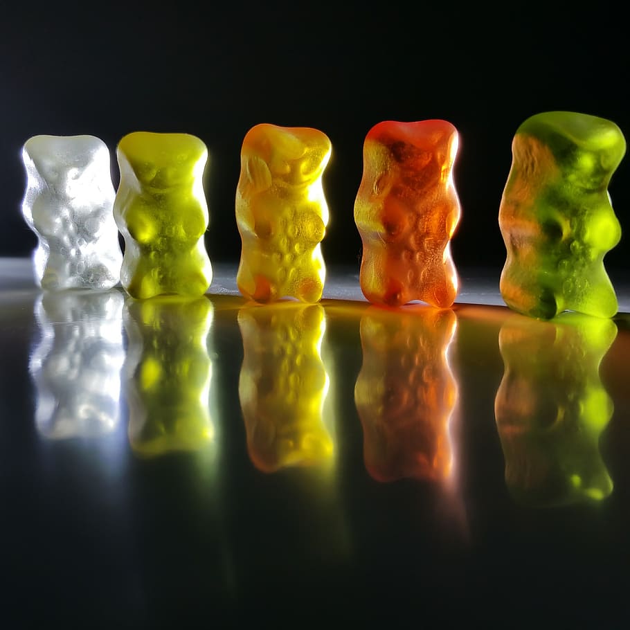 five, assorted-color jelly candies, gummibärchen, gummi bears, bear, fruit jelly, haribo, background image, reflection, indoors