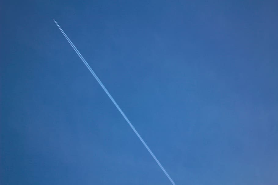 airplane, contrails, blue, vapor trail, sky, cloud - sky, air vehicle, low angle view, transportation, flying