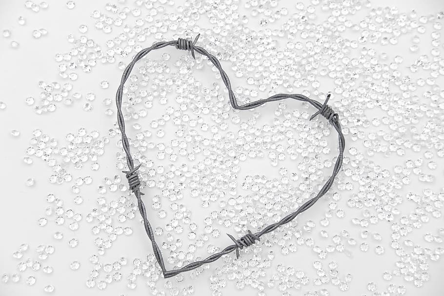 heart, diamonds, love, romance, relationship, connectedness, caught, security, defense, barbed wire