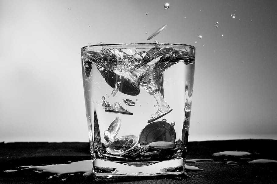 coins, monochrome, water, luxury, money, whisky tumbler, water splash, food and drink, drinking glass, household equipment